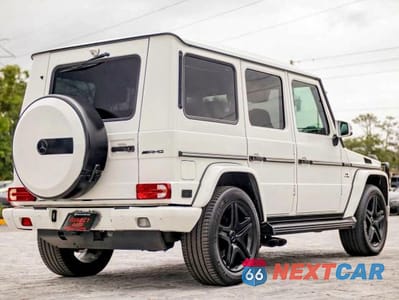 Czwarte zdjęcie samochodu z boku: 2015 MERCEDES-BENZ G 63 AMG VIN:WDCYC7DF4FX229891 - miniatura