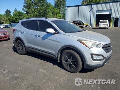 Czwarte zdjęcie samochodu z boku: 2014 HYUNDAI SANTA FE SPORT 2.4L VIN:5XYZU3LB9EG158039 - miniatura