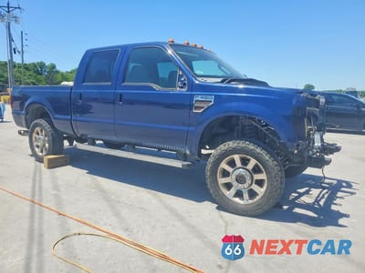 Czwarte zdjęcie samochodu z boku: 2010 FORD F350 SUPER DUTY VIN:1FTWW3BR5AEA22568 - miniatura