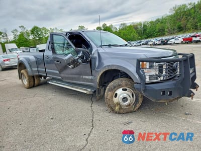 Czwarte zdjęcie samochodu z boku: 2022 FORD F350 SUPER DUTY VIN:1FT8W3DT2NEF77548 - miniatura