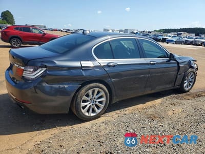 Trzecie zdjęcie samochodu z tyłu: 2015 BMW 740 I VIN:WBAYA6C59FGK16582 - miniatura