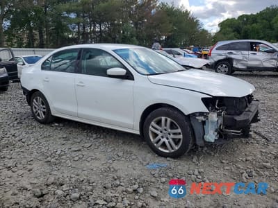 Czwarte zdjęcie samochodu z boku: 2018 VOLKSWAGEN JETTA S VIN:3VW2B7AJ7JM252097 - miniatura