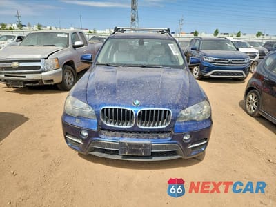 Piąte zdjęcie samochodu w środku: 2011 BMW X5 VIN:5UXZV4C53BL405700 - miniatura