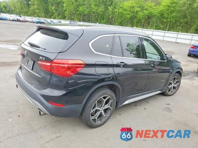 Trzecie zdjęcie samochodu z tyłu: 2018 BMW X1 XDRIVE28I VIN:WBXHT3C39J5K23453 - miniatura