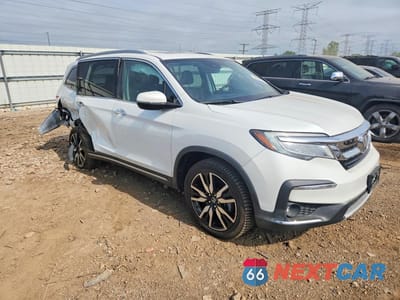 Czwarte zdjęcie samochodu z boku: 2020 HONDA PILOT TOURING VIN:5FNYF6H92LB048743 - miniatura