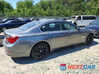 Trzecie zdjęcie samochodu z tyłu: 2014 BMW 740 I VIN:WBAYA6C54ED144335 - miniatura