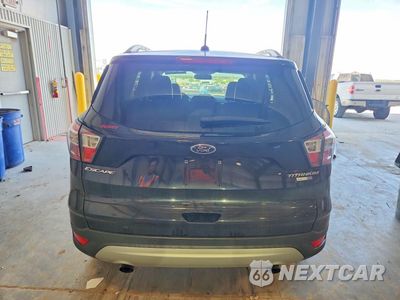 Zdjęcie 6 z 13 samochodu: 2017 FORD ESCAPE TITANIUM VIN:1FMCU9JD4HUD02401 - miniatura