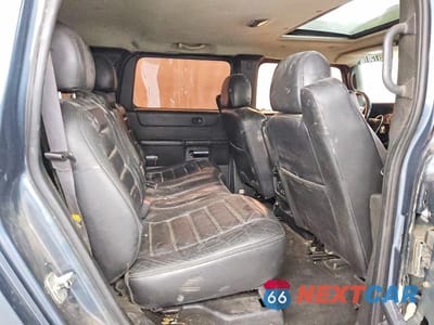 Zdjęcie 11 z 13 samochodu: 2005 HUMMER H2 VIN:5GRGN23U35H100787 - miniatura