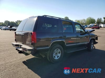 Trzecie zdjęcie samochodu z tyłu: 1997 CHEVROLET TAHOE K1500 VIN:1GNEK13R0VJ375945 - miniatura