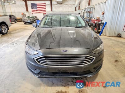 Piąte zdjęcie samochodu w środku: 2017 FORD FUSION SE HYBRID VIN:3FA6P0LU4HR250671 - miniatura