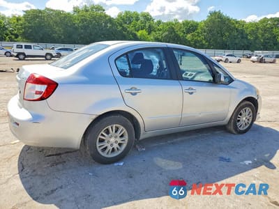 Trzecie zdjęcie samochodu z tyłu: 2013 SUZUKI SX4 LE VIN:JS2YC5A33D6100537 - miniatura