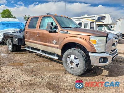 Czwarte zdjęcie samochodu z boku: 2011 FORD F350 SUPER DUTY VIN:1FT8W3DTXBEA88763 - miniatura