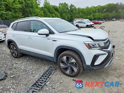 Czwarte zdjęcie samochodu z boku: 2024 VOLKSWAGEN TAOS SE VIN:3VVVX7B23RM113381 - miniatura