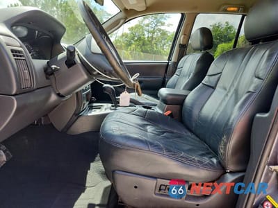 Zdjęcie 7 z 13 samochodu: 2004 JEEP GRAND CHEROKEE LAREDO VIN:1J8GX48SX4C295659 - miniatura