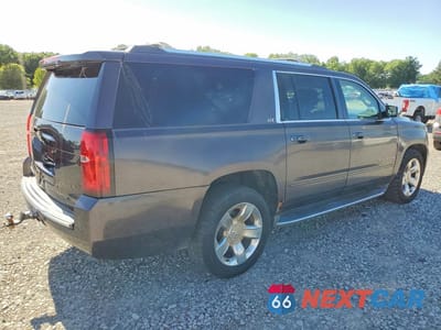 Trzecie zdjęcie samochodu z tyłu: 2015 CHEVROLET SUBURBAN K1500 LTZ VIN:1GNSKKKC5FR636804 - miniatura