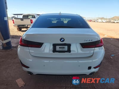 Zdjęcie 6 z 12 samochodu: 2021 BMW 330I VIN:3MW5R1J03M8C04655 - miniatura