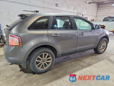 Trzecie zdjęcie samochodu z tyłu: 2010 FORD EDGE SEL VIN:2FMDK4JC9ABA26071 - miniatura