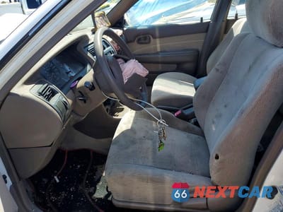 Zdjęcie 7 z 12 samochodu: 1996 TOYOTA COROLLA DX VIN:JT2EB02E9T0112236 - miniatura