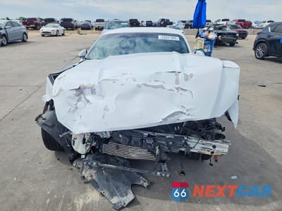 Piąte zdjęcie samochodu w środku: 2017 FORD MUSTANG VIN:1FA6P8TH3H5302280 - miniatura
