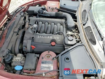 Zdjęcie 11 z 12 samochodu: 2000 JAGUAR XK8 VIN:SAJJA42C7YNA03402 - miniatura