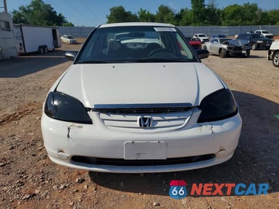 Piąte zdjęcie samochodu w środku: 2001 HONDA CIVIC LX VIN:2HGES16521H569875 - miniatura