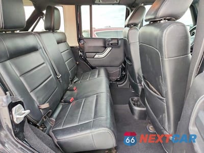Zdjęcie 11 z 14 samochodu: 2012 JEEP WRANGLER UNLIMITED SAHARA VIN:1C4BJWEG8CL184802 - miniatura