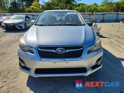 Piąte zdjęcie samochodu w środku: 2016 SUBARU IMPREZA PREMIUM PLUS VIN:JF1GJAF63GH012903 - miniatura