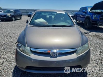 Piąte zdjęcie samochodu w środku: 2006 HONDA CIVIC LX VIN:1HGFA16596L016951 - miniatura