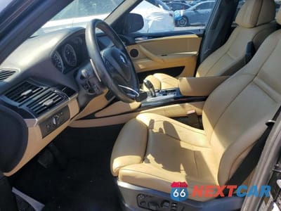 Zdjęcie 7 z 12 samochodu: 2011 BMW X5 M VIN:5YMGY0C56BLK26311 - miniatura