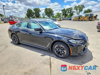 Czwarte zdjęcie samochodu z boku: 2024 BMW I4 EDRIVE 35 VIN:WBY43AW07RFS74584 - miniatura