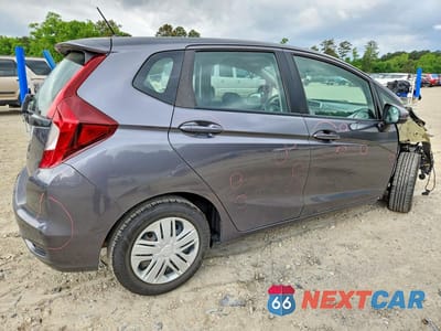 Trzecie zdjęcie samochodu z tyłu: 2019 HONDA FIT LX VIN:3HGGK5H4XKM704222 - miniatura