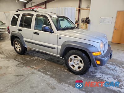 Czwarte zdjęcie samochodu z boku: 2007 JEEP LIBERTY SPORT VIN:1J4GL48K77W510432 - miniatura