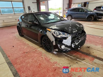 Czwarte zdjęcie samochodu z boku: 2015 HYUNDAI VELOSTER TURBO VIN:KMHTC6AE3FU229612 - miniatura