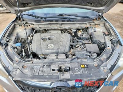 Zdjęcie 12 z 13 samochodu: 2014 MAZDA CX-5 TOURING VIN:JM3KE4CY7E0411851 - miniatura