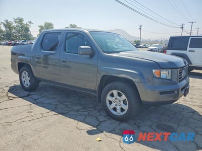Czwarte zdjęcie samochodu z boku: 2007 HONDA RIDGELINE RTS VIN:2HJYK16467H513624 - miniatura