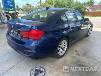 Czwarte zdjęcie samochodu z boku: 2018 BMW 320 I VIN:WBA8E1G50JNU91361 - miniatura