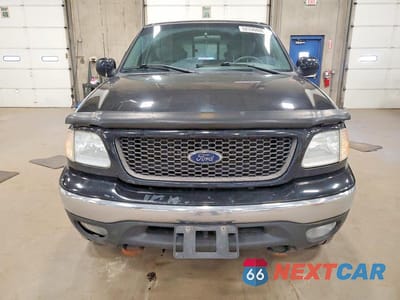 Piąte zdjęcie samochodu w środku: 2003 FORD F150 SUPERCREW VIN:1FTRW08L03KA65945 - miniatura