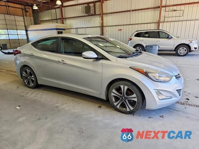 Czwarte zdjęcie samochodu z boku: 2014 HYUNDAI ELANTRA SPORT VIN:KMHDH4AH6EU130804 - miniatura