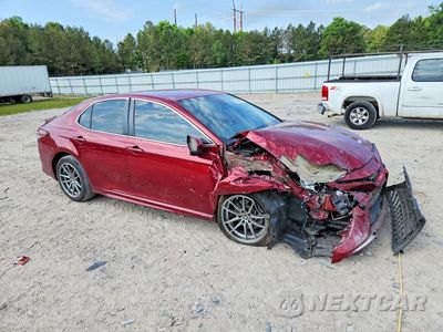 Czwarte zdjęcie samochodu z boku: 2018 TOYOTA CAMRY SE VIN:4T1B11HK8JU566561 - miniatura
