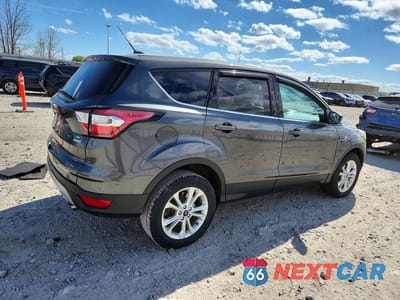 Trzecie zdjęcie samochodu z tyłu: 2017 FORD ESCAPE SE VIN:1FMCU0GD5HUE04356 - miniatura