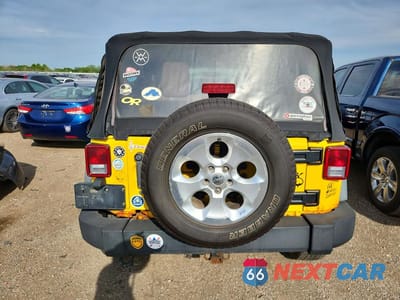 Zdjęcie 6 z 12 samochodu: 2011 JEEP WRANGLER VIN:1J4GA2D11BL533223 - miniatura