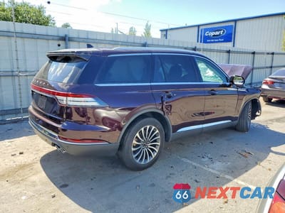 Trzecie zdjęcie samochodu z tyłu: 2023 LINCOLN AVIATOR RESERVE VIN:5LM5J7XC6PGL02513 - miniatura