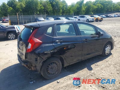 Trzecie zdjęcie samochodu z tyłu: 2018 HONDA FIT LX VIN:3HGGK5H44JM735352 - miniatura