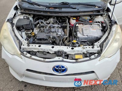 Zdjęcie 11 z 12 samochodu: 2013 TOYOTA PRIUS C TWO VIN:JTDKDTB32D1050727 - miniatura