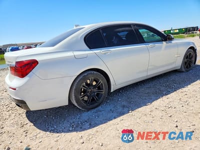 Trzecie zdjęcie samochodu z tyłu: 2013 BMW 750 LXI VIN:WBAYF8C57DD140596 - miniatura