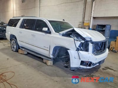 Czwarte zdjęcie samochodu z boku: 2015 GMC YUKON XL K1500 SLT VIN:1GKS2HKC9FR127394 - miniatura