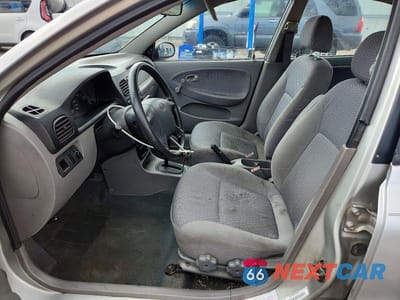 Zdjęcie 7 z 12 samochodu: 2002 KIA RIO BASE VIN:KNADC123X26198833 - miniatura