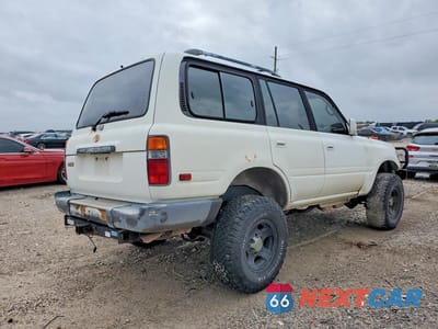 Trzecie zdjęcie samochodu z tyłu: 1997 TOYOTA LAND CRUISER HJ85 VIN:JT3HJ85J1V0166166 - miniatura