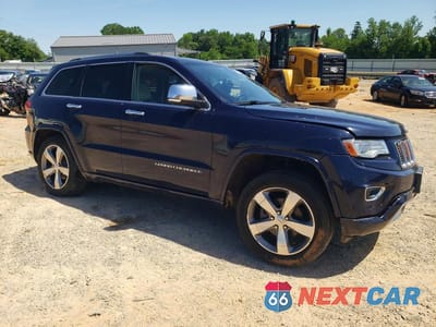 Czwarte zdjęcie samochodu z boku: 2014 JEEP GRAND CHEROKEE OVERLAND VIN:1C4RJFCGXEC416515 - miniatura
