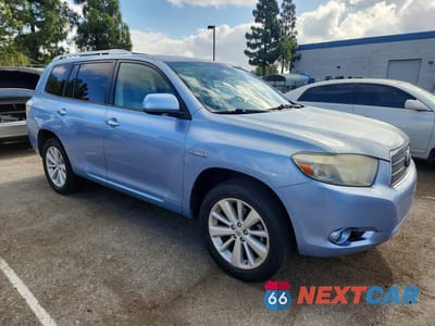 Czwarte zdjęcie samochodu z boku: 2010 TOYOTA HIGHLANDER HYBRID LIMITED VIN:JTEJW3EH3A2048015 - miniatura